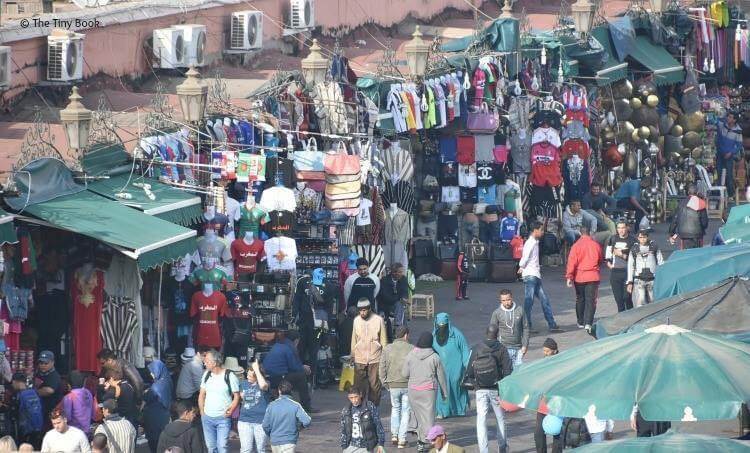 Chaos and confusion in Place Jemaa el Fna. Avoid scams in Marrakech