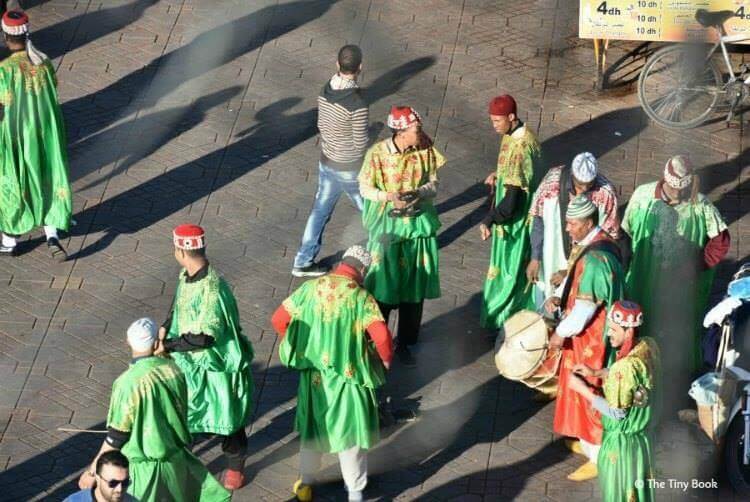 Moroccan traditional dancers. Get your coins ready. Avoid scams in Marrakech