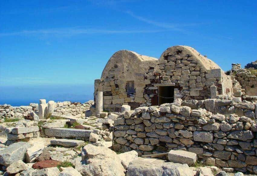 Alternative Santorini for children, a day with the family outside Fira. Buildings tended to have this shape to protect them from the strong winds.