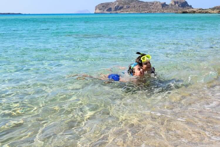 Kids swimming Falassarna, Crete.