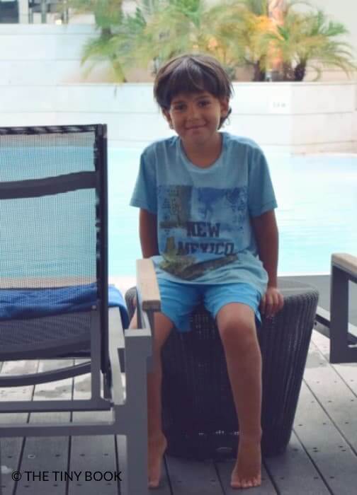 Boy in pool deck, Galaxy Hotel Iraklio