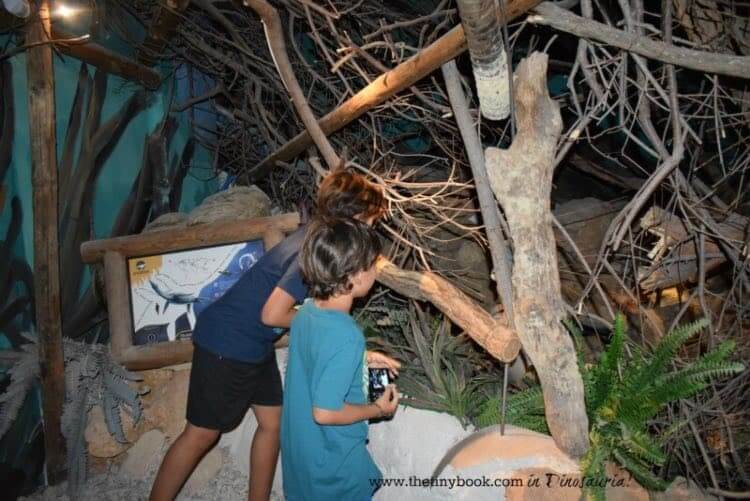 Kids playing in dinosaur theme park, Crete.