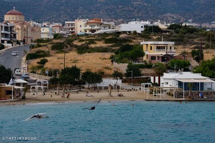 Stunning Beaches in East Crete (Lasithi Region): Complete Insider's Guide 20 Beaches in East Crete Amoudi beach. Behind, the church of Agios Antonios.