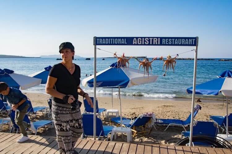 Nea Chora beach, umbrellas, octopus, sea, sand, photographer