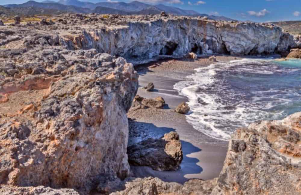 Stunning Beaches in East Crete (Lasithi Region): Complete Insider's Guide 10 Beaches in East Crete cliffs, rocks, sand, seaside - Pigada beach, Milatos, Crete