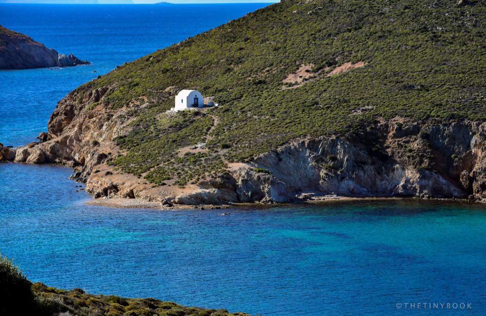 Blue sea, green hills, small white church - Patmos island