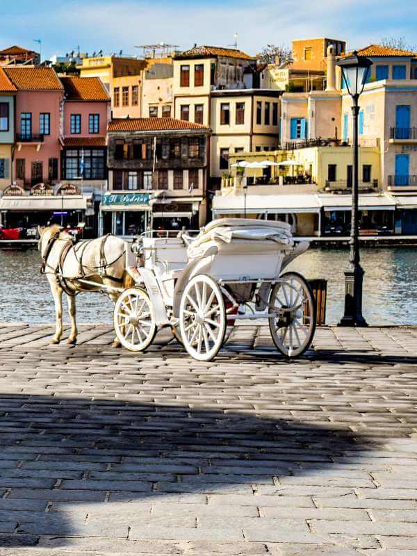 Gay Travel in Crete: Insanely Useful Guide to the Top LGBT-Friendly Spots on the Island! 5 gay travel Crete Chania horse old Venetian port