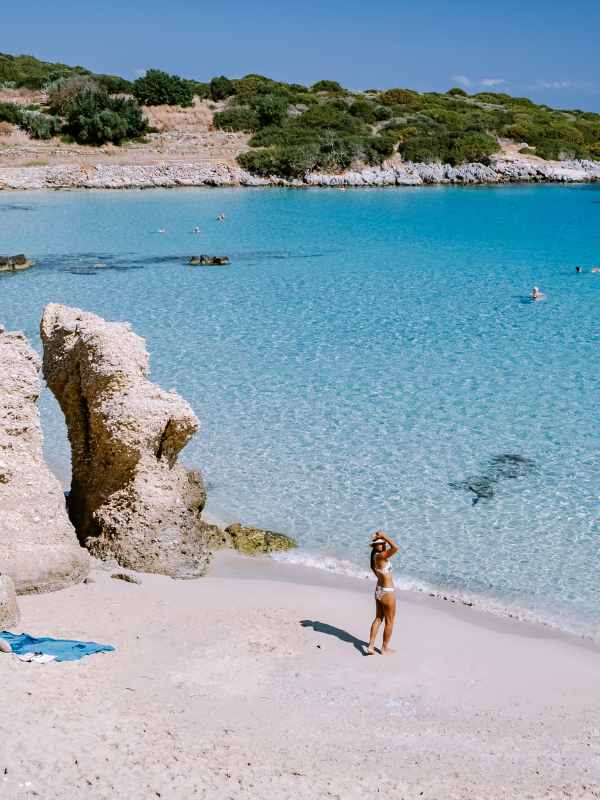 Solo female travel at the beach in Crete.